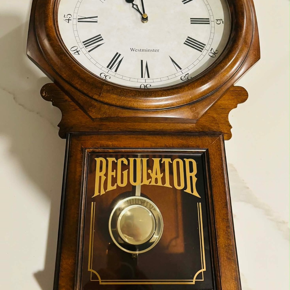 Bulova wall clock in good condition for pick up only